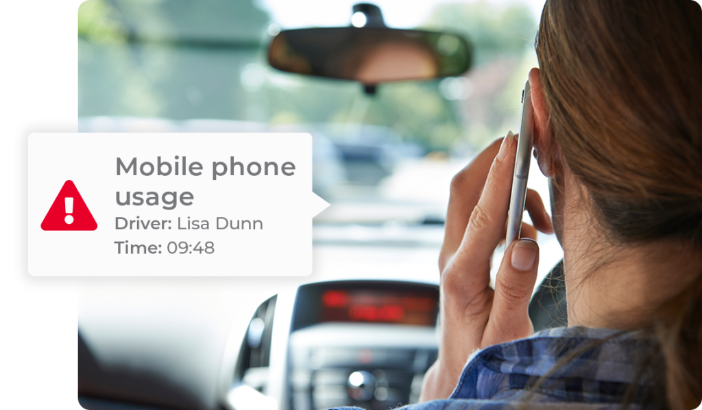distracted_driving_warning_icon_driver_using_mobile_phone_while_driving
